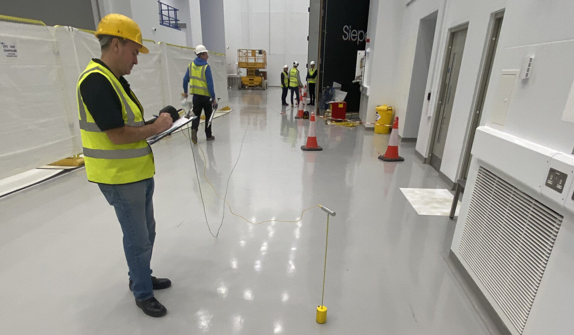 A company having a resin floor installed after learning how to choose a resin flooring contractor.